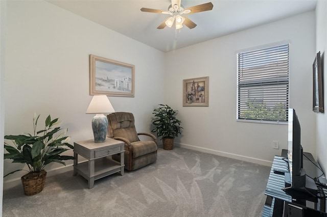 4961 Seafoam Trl, Bradenton, FL 34211 - sitting room featuring a ceiling fan and carpet floors