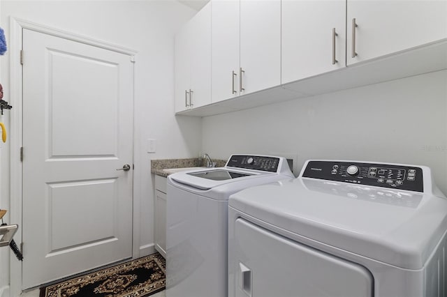 4961 Seafoam Trl, Bradenton, FL 34211 - washroom with washer and dryer and cabinet space
