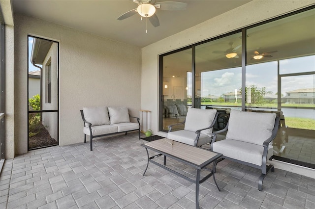 4961 Seafoam Trl, Bradenton, FL 34211 - sunroom / solarium with a ceiling fan and outdoor lounge area
