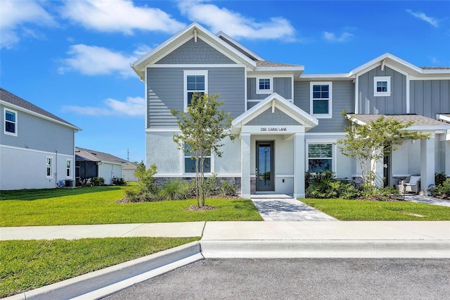 7352 Cabin Ln, Sarasota, FL 34240 - view of front of property featuring a front yard