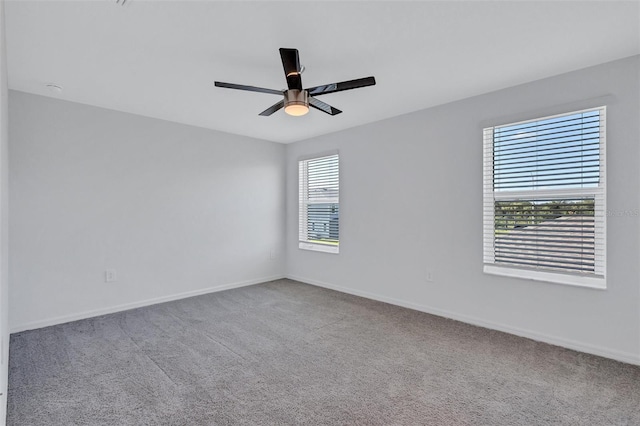 7352 Cabin Ln, Sarasota, FL 34240 - carpeted spare room with ceiling fan and baseboards