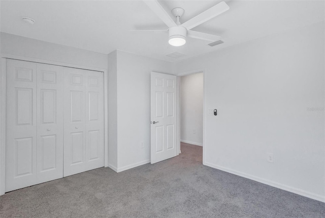 7352 Cabin Ln, Sarasota, FL 34240 - unfurnished bedroom featuring carpet floors, a closet, and ceiling fan