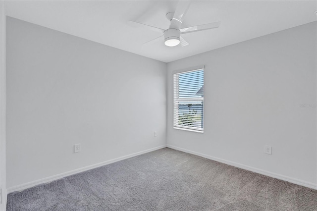 7352 Cabin Ln, Sarasota, FL 34240 - carpeted spare room featuring baseboards and a ceiling fan