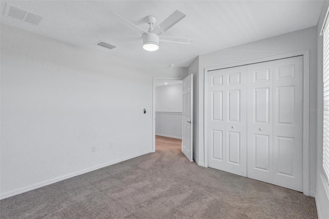 7352 Cabin Ln, Sarasota, FL 34240 - unfurnished bedroom with carpet flooring, a closet, and a ceiling fan