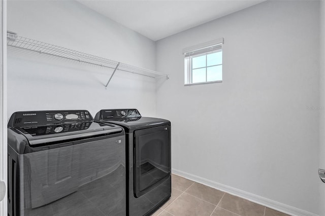 7352 Cabin Ln, Sarasota, FL 34240 - laundry room featuring independent washer and dryer and tile patterned floors