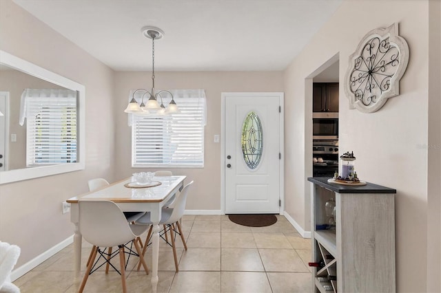 5891 Welcome Rd Unit I6, Bradenton, FL 34207 - entryway featuring a chandelier and light tile patterned floors