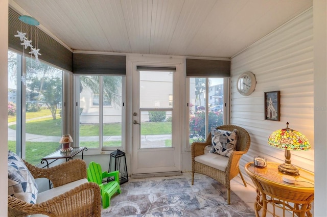 5891 Welcome Rd Unit I6, Bradenton, FL 34207 - sunroom with plenty of natural light, wooden ceiling, and wood walls