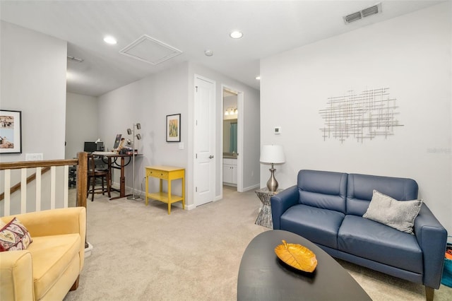 3673 Fescue Ln, Sarasota, FL 34232 - living room featuring light colored carpet, recessed lighting, and a desk