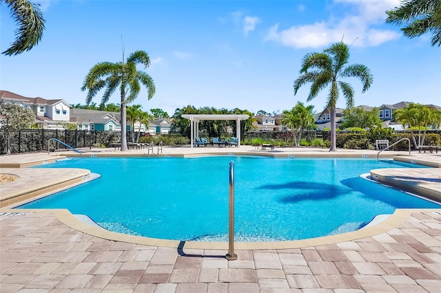 3673 Fescue Ln, Sarasota, FL 34232 - community pool featuring a residential view and a patio