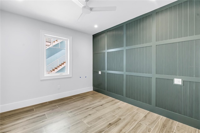 646 Calle Del Otono, Sarasota, FL 34242 - unfurnished bedroom with wood finished floors, ceiling fan, and recessed lighting