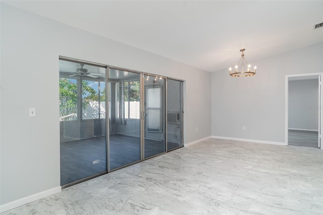 3805 Sandpointe Dr, Bradenton, FL 34205 - empty room with a chandelier, marble look tile flooring, and a ceiling fan