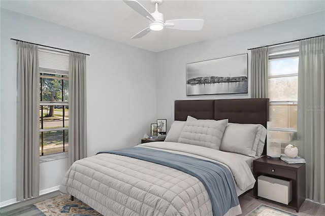 3805 Sandpointe Dr, Bradenton, FL 34205 - bedroom with wood finished floors and a ceiling fan