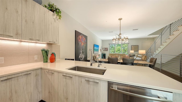 626 Rawls Ave Unit 626, Sarasota, FL 34236 - kitchen with dishwasher, modern cabinets, light brown cabinetry, and light countertops