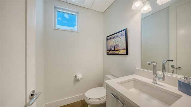 626 Rawls Ave Unit 626, Sarasota, FL 34236 - half bath featuring vanity and wood finished floors