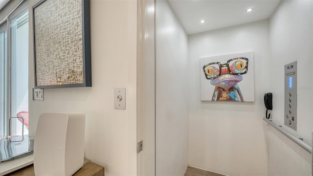626 Rawls Ave Unit 626, Sarasota, FL 34236 - hall featuring elevator and recessed lighting