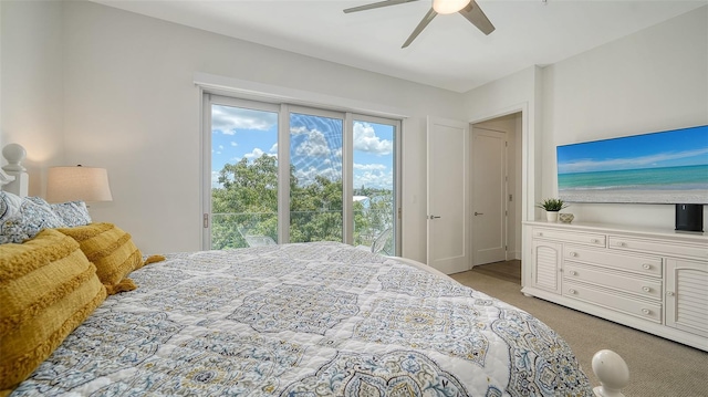 626 Rawls Ave Unit 626, Sarasota, FL 34236 - bedroom featuring access to outside, light carpet, and a ceiling fan