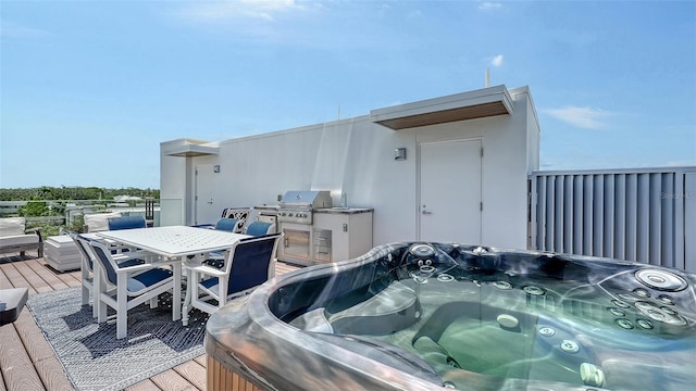 626 Rawls Ave Unit 626, Sarasota, FL 34236 - deck featuring a hot tub, outdoor dining space, and area for grilling