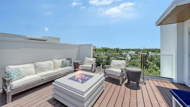 626 Rawls Ave Unit 626, Sarasota, FL 34236 - wooden terrace featuring an outdoor living space with a fire pit
