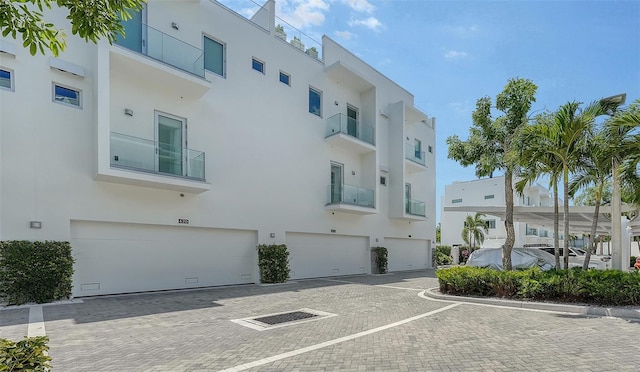 626 Rawls Ave Unit 626, Sarasota, FL 34236 - view of building exterior with an attached garage