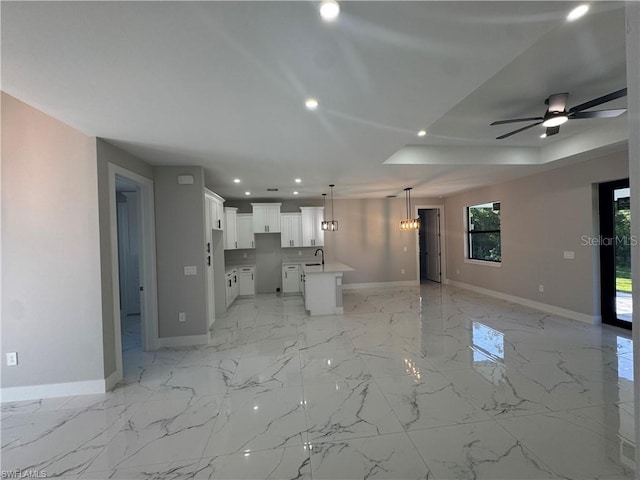 3003 18th St W, Lehigh Acres, FL 33971 - unfurnished living room featuring recessed lighting, a ceiling fan, and light marble finish flooring