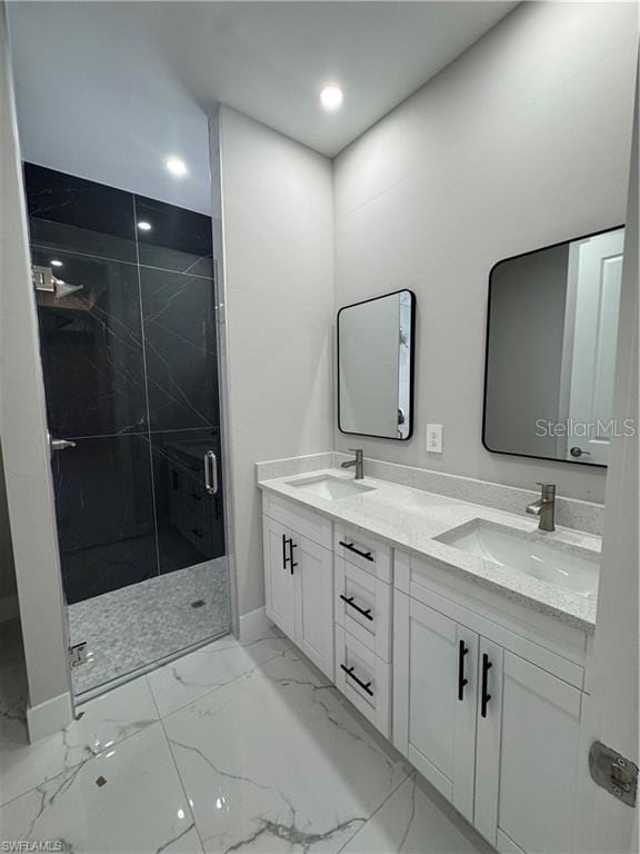 3003 18th St W, Lehigh Acres, FL 33971 - bathroom featuring double vanity, a marble finish shower, marble look tiles, and recessed lighting