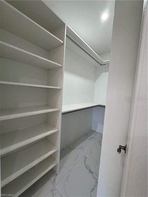 3003 18th St W, Lehigh Acres, FL 33971 - spacious closet with marble finish floors