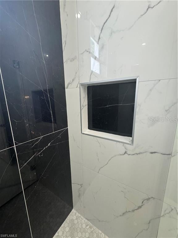 3003 18th St W, Lehigh Acres, FL 33971 - bathroom view of a marble finish shower