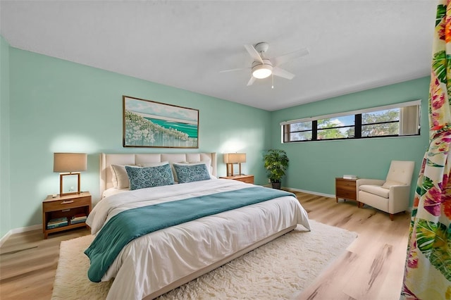 6061 Fairway Ln Unit 1411, Bradenton, FL 34210 - bedroom featuring wood finished floors and ceiling fan