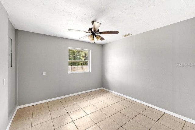 17211 Drayton Ln, Port Charlotte, FL 33948 - unfurnished room featuring a ceiling fan and light tile patterned floors