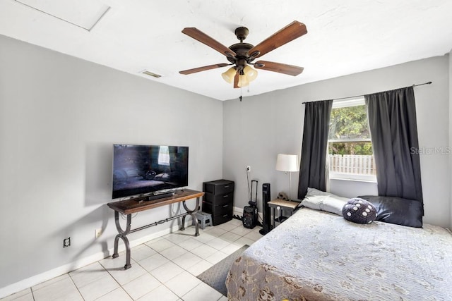 17211 Drayton Ln, Port Charlotte, FL 33948 - bedroom featuring light tile patterned flooring and ceiling fan