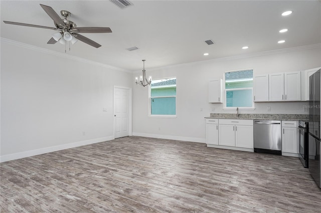 1515 2nd Ave W, Palmetto, FL 34221 - kitchen featuring stainless steel dishwasher, light wood finished floors, a chandelier, ornamental molding, and white cabinetry