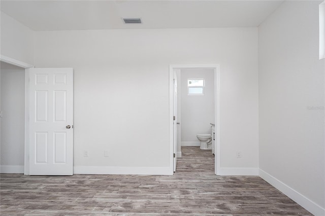 1515 2nd Ave W, Palmetto, FL 34221 - unfurnished room featuring wood finished floors