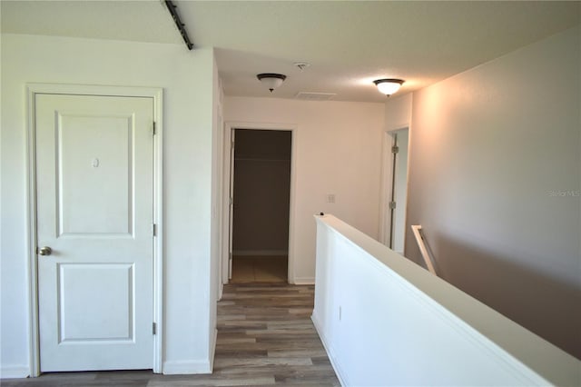 10019 Geese Trail Cir, Sun City Center, FL 33573 - corridor with an upstairs landing and light wood-style flooring