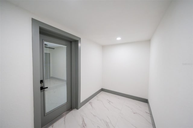 211 22nd Street Ct NE, Bradenton, FL 34208 - spare room with light marble finish flooring and recessed lighting