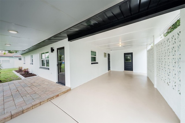 211 22nd Street Ct NE, Bradenton, FL 34208 - view of patio with a carport