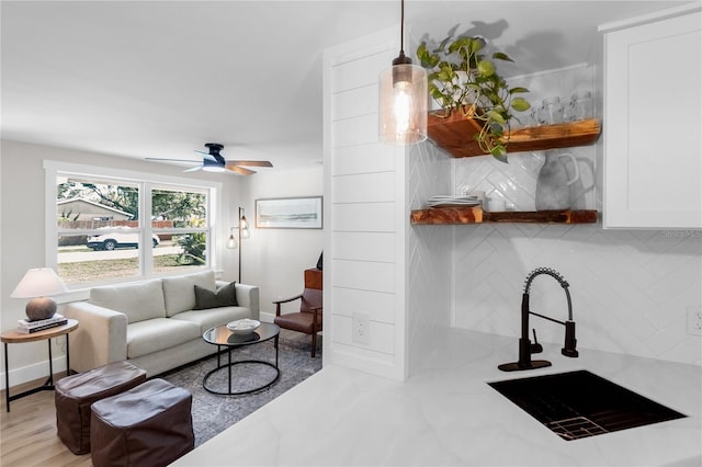 4041 Linwood St, Sarasota, FL 34232 - living area featuring ceiling fan and baseboards
