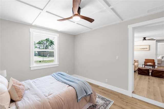 4041 Linwood St, Sarasota, FL 34232 - bedroom with light wood-style flooring, a ceiling fan, and coffered ceiling