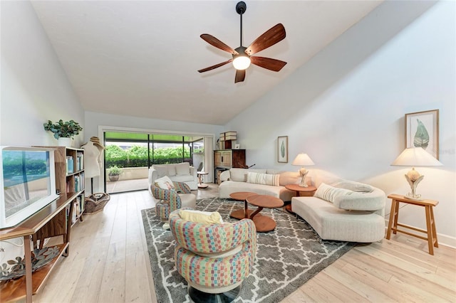 6111 Courtside Dr Unit 61, Bradenton, FL 34210 - living area featuring a ceiling fan, high vaulted ceiling, and hardwood / wood-style flooring