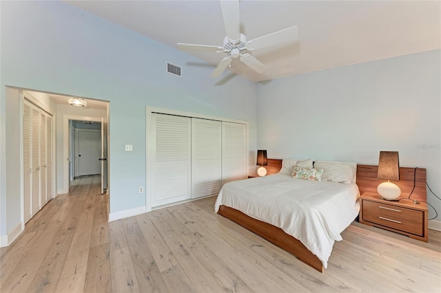 6111 Courtside Dr Unit 61, Bradenton, FL 34210 - bedroom with light wood finished floors, a closet, a towering ceiling, and ceiling fan