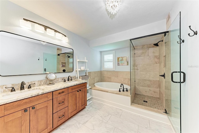 6111 Courtside Dr Unit 61, Bradenton, FL 34210 - bathroom featuring a garden tub, a shower stall, double vanity, and marble finish flooring