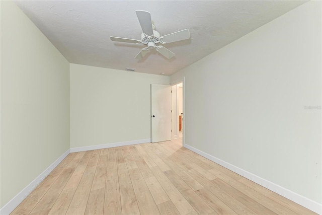 6111 Courtside Dr Unit 61, Bradenton, FL 34210 - unfurnished room featuring light wood-style flooring and a ceiling fan