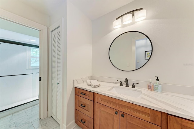 6111 Courtside Dr Unit 61, Bradenton, FL 34210 - bathroom featuring a closet, vanity, and marble look tile flooring