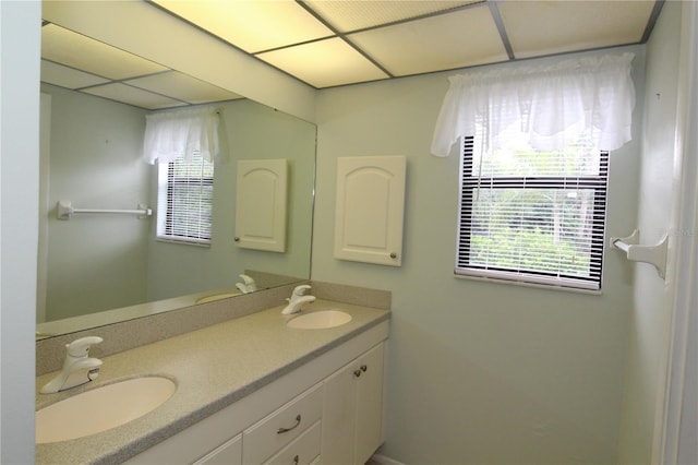 753 Tropical Cir, Sarasota, FL 34242 - full bathroom featuring double vanity and healthy amount of natural light
