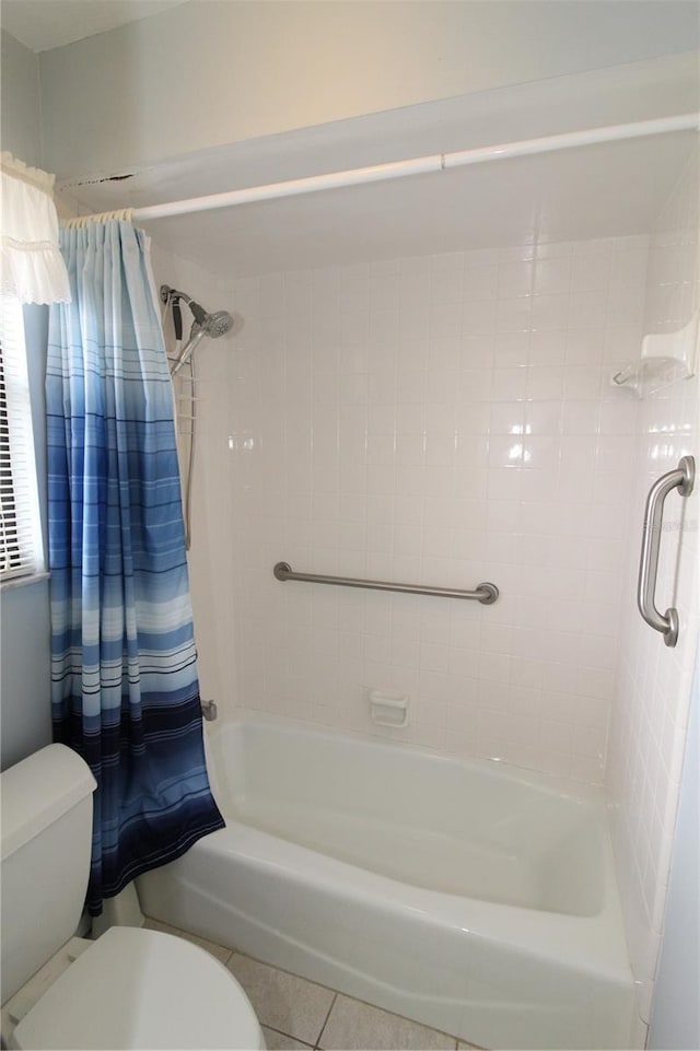 753 Tropical Cir, Sarasota, FL 34242 - bathroom with shower / tub combo and tile patterned flooring