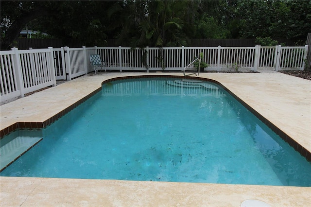 753 Tropical Cir, Sarasota, FL 34242 - view of swimming pool featuring a patio and a fenced backyard