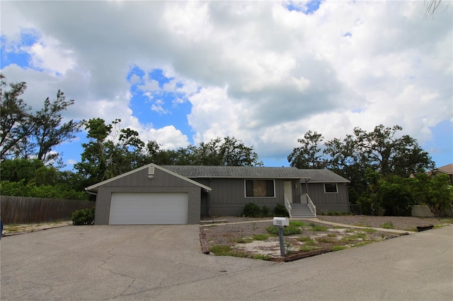 753 Tropical Cir, Sarasota, FL 34242 - single story home with concrete driveway and a garage