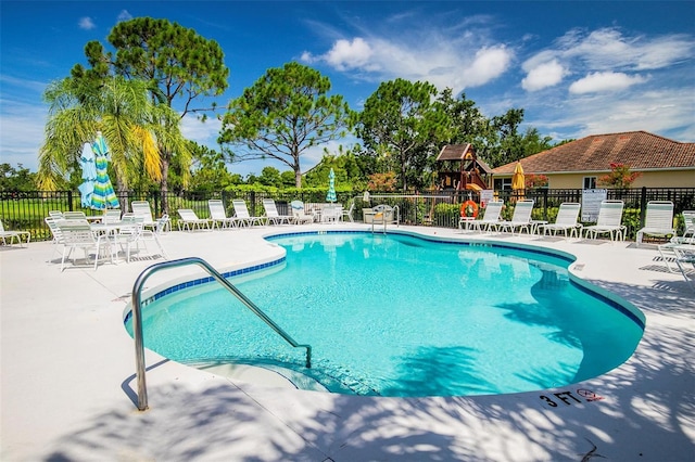 7747 33rd St E, Sarasota, FL 34243 - community pool featuring a patio area