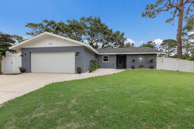 8985 Pohoy Ave, Sarasota, FL 34231 - ranch-style home featuring a gate, a garage, driveway, and stucco siding