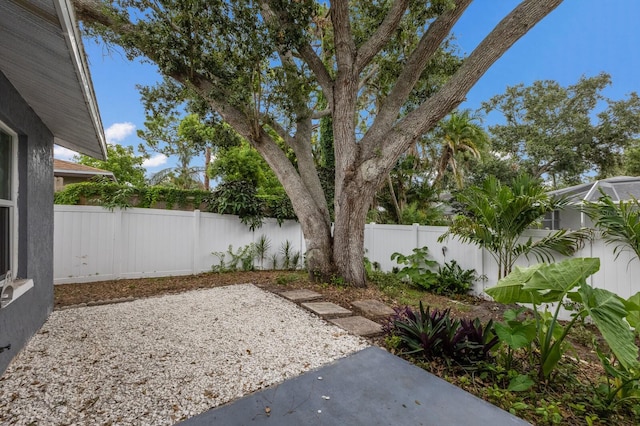 8985 Pohoy Ave, Sarasota, FL 34231 - fenced backyard featuring a patio