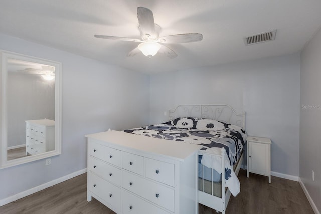 8985 Pohoy Ave, Sarasota, FL 34231 - bedroom featuring wood finished floors and ceiling fan